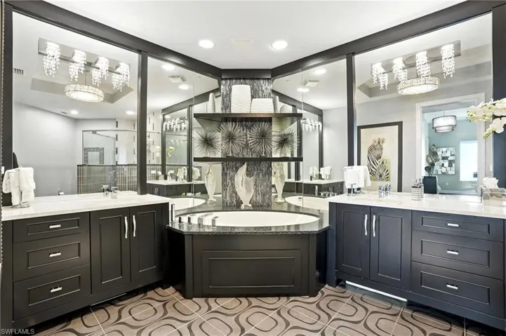 Bathroom featuring two vanities and a shower stall - Virtually Edited Image