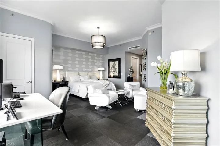 Bedroom with ornamental molding and a desk - Virtually Edited Image