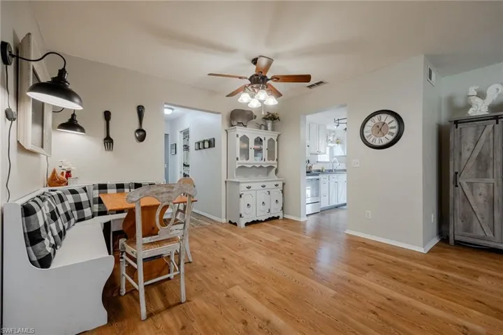 Dinette area looking toward Primary Suite and Kitchen entrance