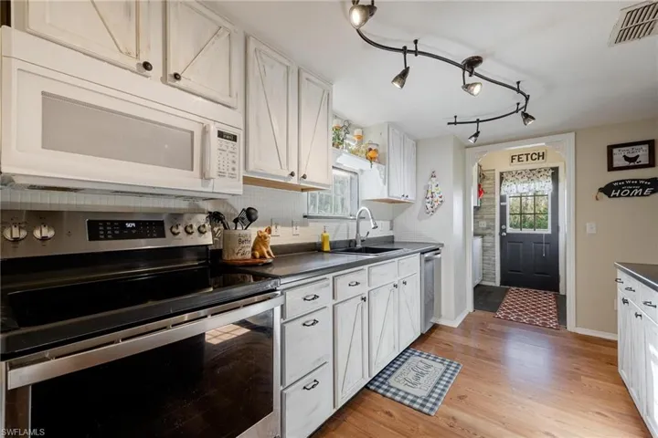 Farmhouse Kitchen with Butler's Pantry and exterior exit.