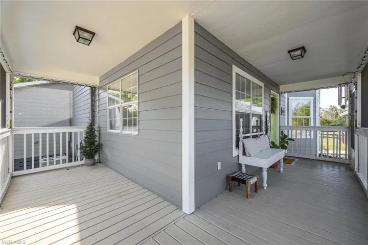 Front wrap around screened porch.