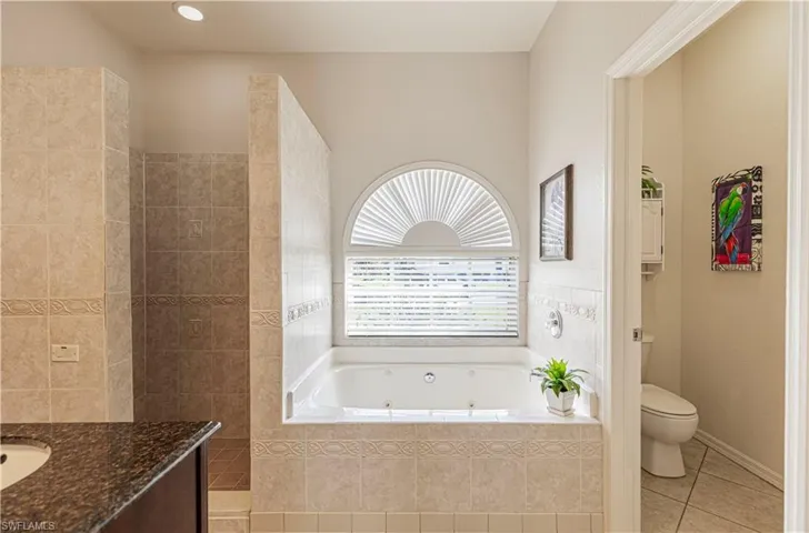 Separate jetted tub and shower in the master is a must!