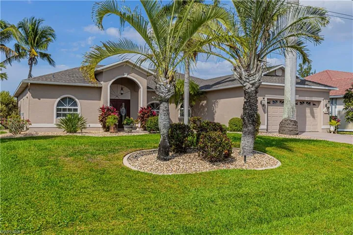 Lush Mature landscape surround this lovely home!