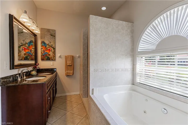 Escape the day in this large jetted tub