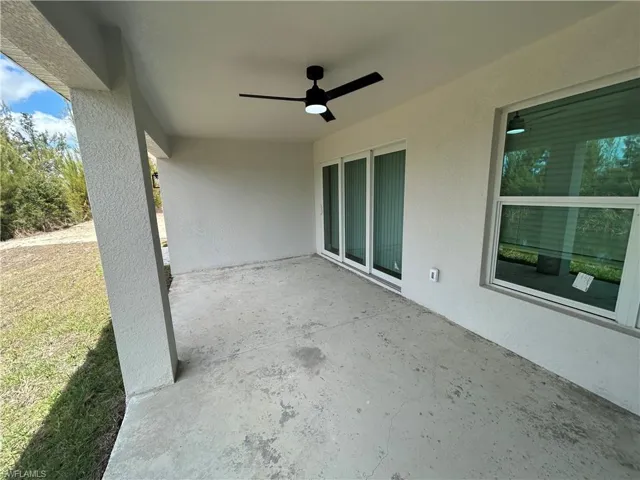 View of patio / terrace featuring a ceiling fan