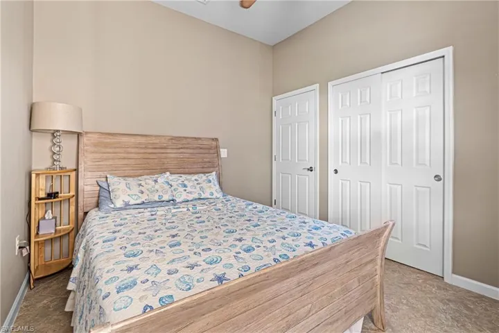 Bedroom featuring baseboards and a closet