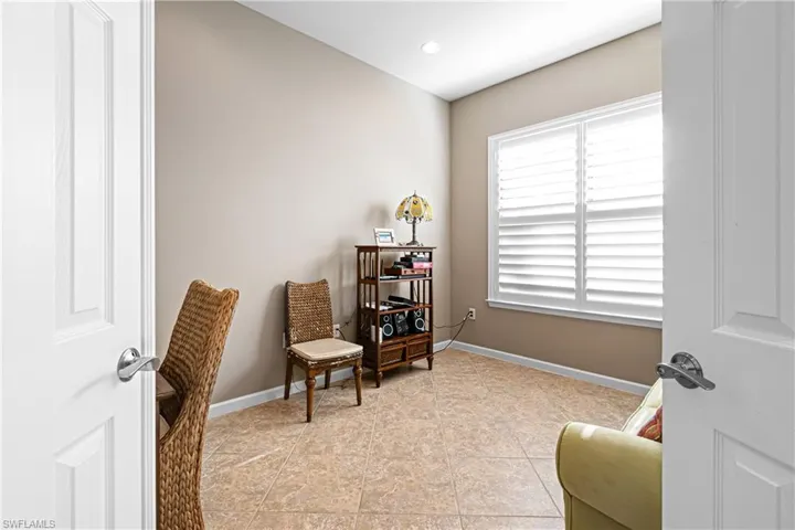 Living area featuring baseboards