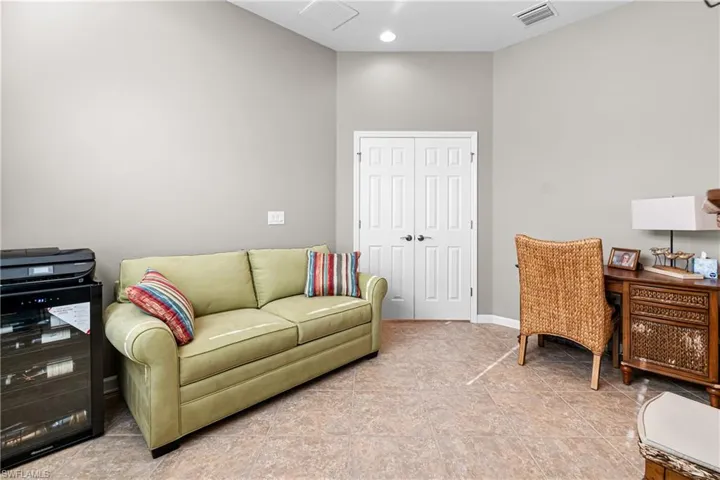 Tiled home office with baseboards