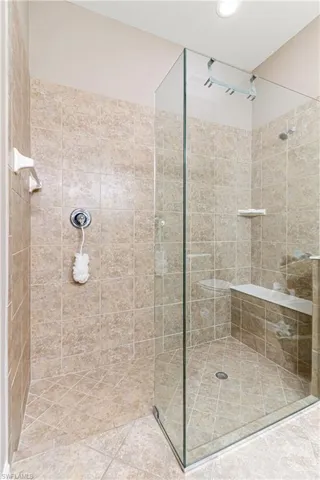 Bathroom with a tile shower
