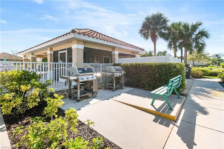 View of patio featuring area for grilling