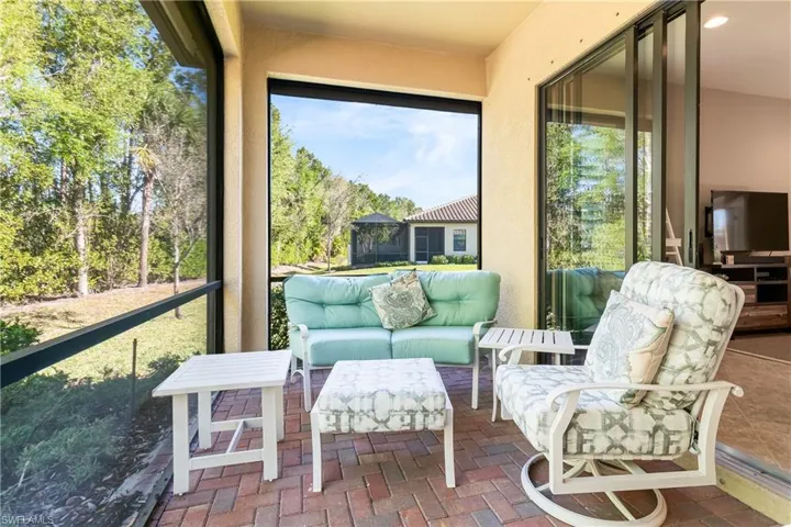 Sunroom featuring an outdoor living space