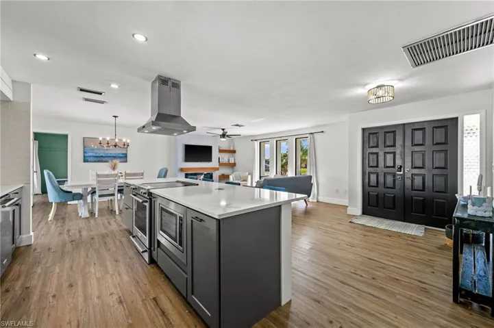 View of the Kitchen and the Double-Door Entryway