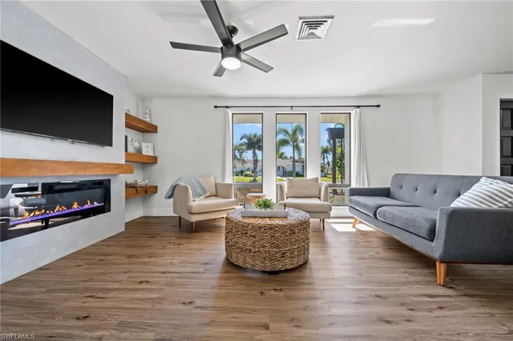 Open Airy Living Room with Linear Electric Fireplace