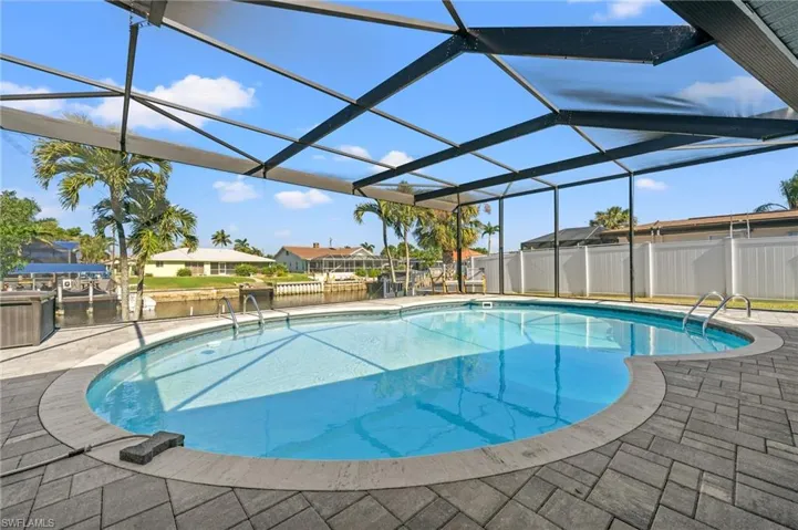 Pool Area with Picture Window Screen Cage