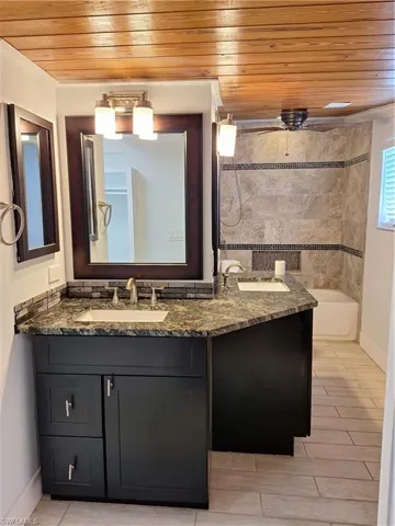 Two Sinks, Tub and Shower