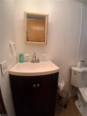 Bathroom featuring vanity and tile patterned floors