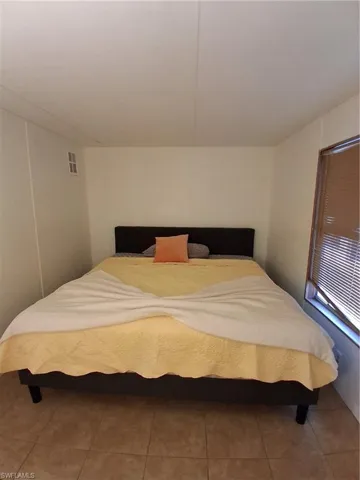 View of tiled bedroom