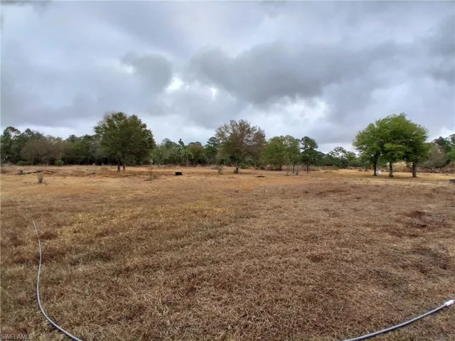 View of yard with a view of countryside