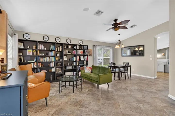 As you walk in through the front door you are greeted with a sitting room and dining room.