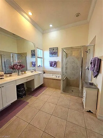 MASTER BATHROOM VIEW FROM WALK IN CLOSET TO TUB