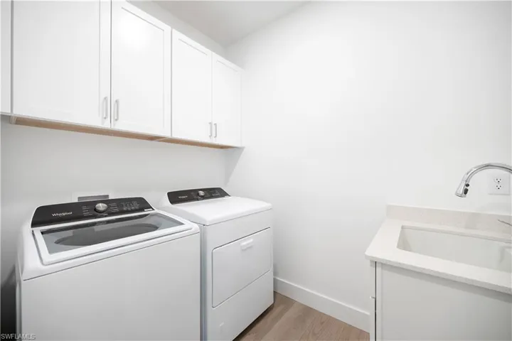 Laundry room with gas dryer