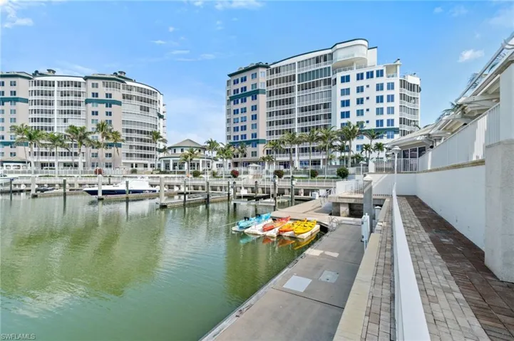 Property view of water featuring a dock