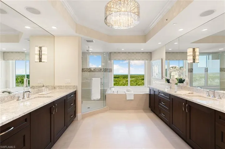 Owners Suite Bath with Split vanities, jetted tub and walk-in shower.