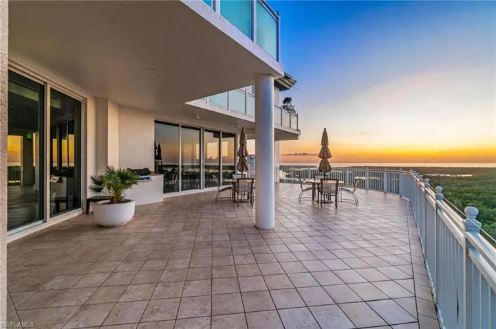 Sky Lounge Patio terrace at dusk featuring a balcony