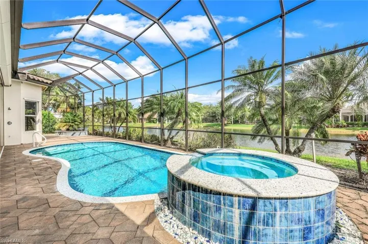 View of swimming pool, in ground spa and extended 80 foot patio.