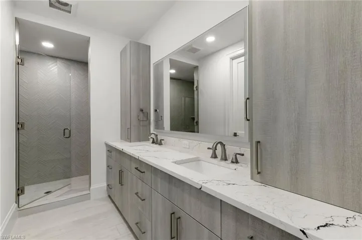 Double sinks with custom cabinates