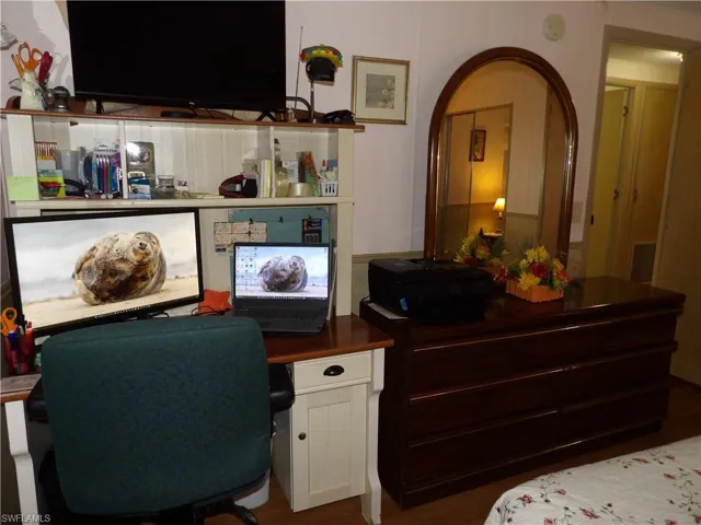 Bedroom with built in desk