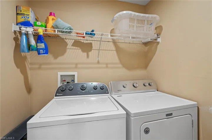Laundry room with washer and dryer