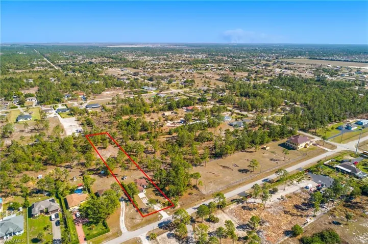 Aerial perspective of suburban area with property boundaries highlighted