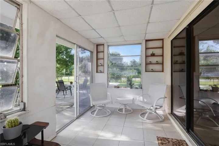 Sunroom with a drop ceiling