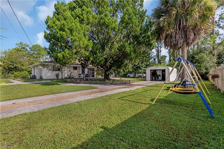 View of yard with a playground