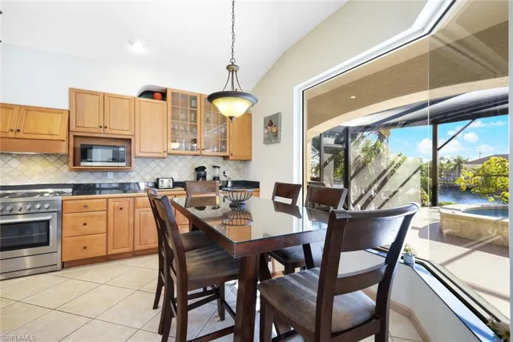 The Dining area overlooks the pool deck