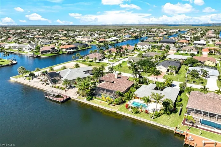 The home is located on a wide Gulf access canal