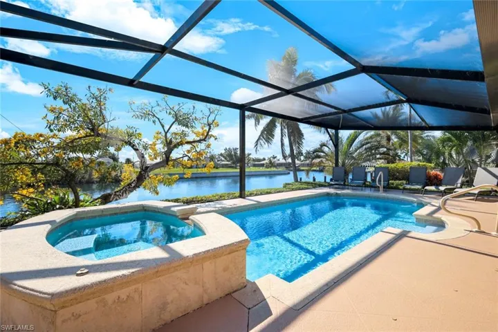 The oversized spa and pool deck