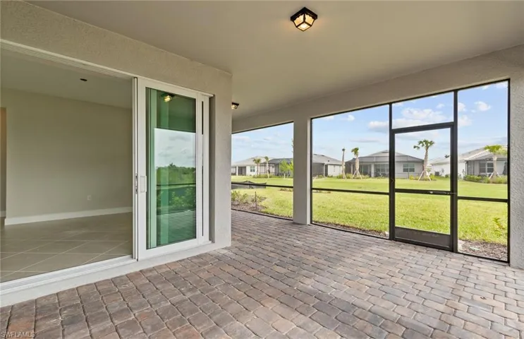 Unfurnished sunroom with a healthy amount of sunlight