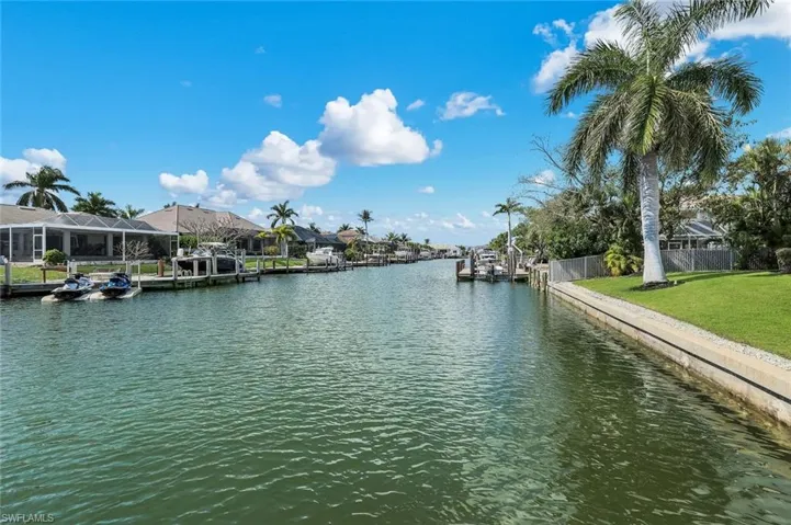 Water view with a boat dock