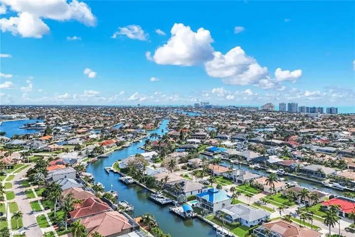 View of urban area featuring a large body of water and nearby suburban area