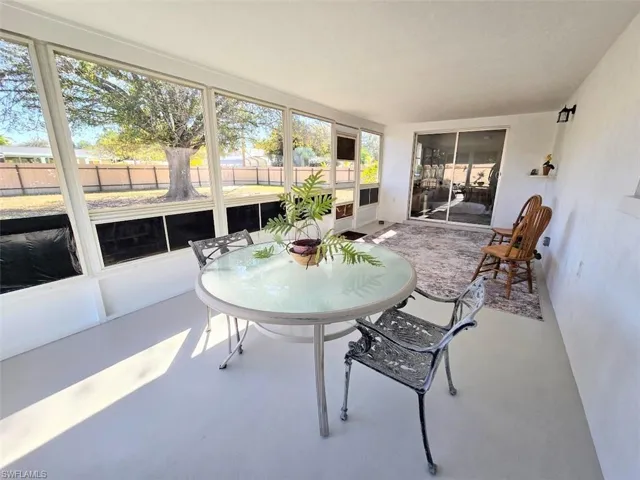 Covered Lanai w/Windows facing Backyard - View 2