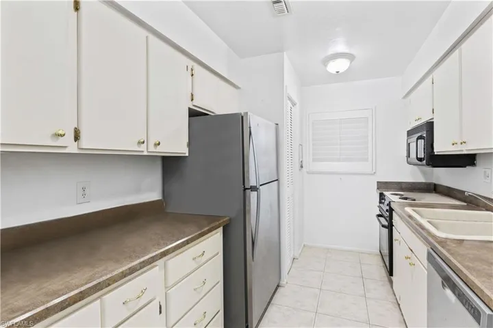 Practical and inviting, the kitchen space is ready to handle everything from quick meals to dinner parties.