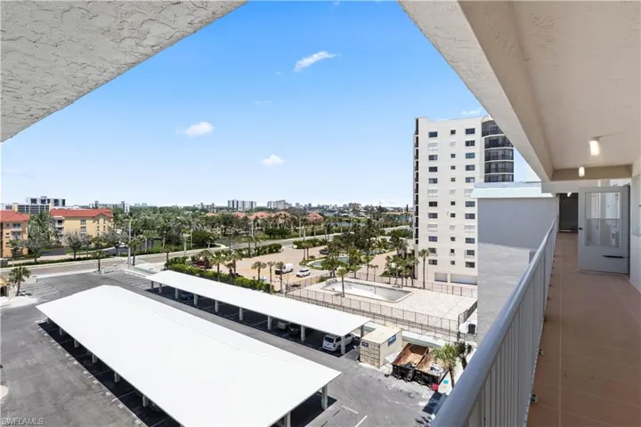 Stepping outside your door, you have a clear and convenient view of the covered carport just a short walk away. The carport provides easy access for unloading and loading, sheltered from sun and rain, making coming and going effortless.
