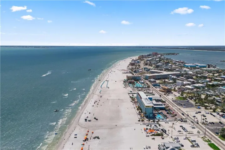 The turquoise waters gently lap the shore, while the charming town blends perfectly with the natural beauty of this iconic Florida destination.
