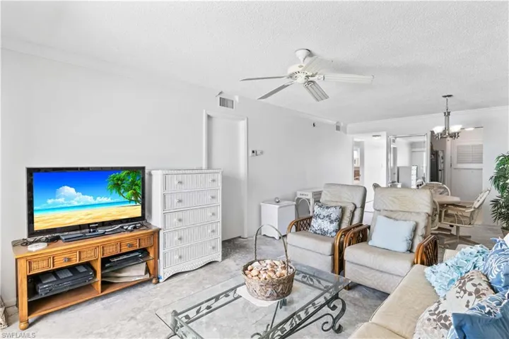 Freshly painted in a neutral, light tone, creating a bright and inviting space ready for your personal touch. With the walls refreshed, the only update needed is your choice of flooring to complete this comfortable and open living space.