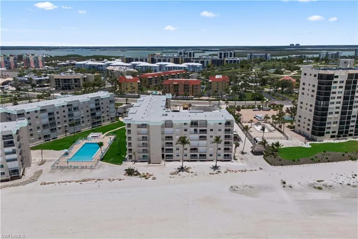 Beachfront condo with pool, views, and location—steps from Santini Plaza and the Gulf!