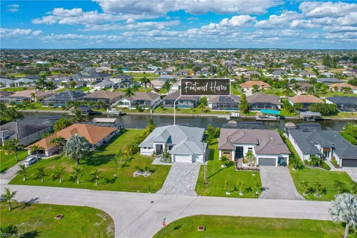 Aerial view of residential area with a nearby body of water