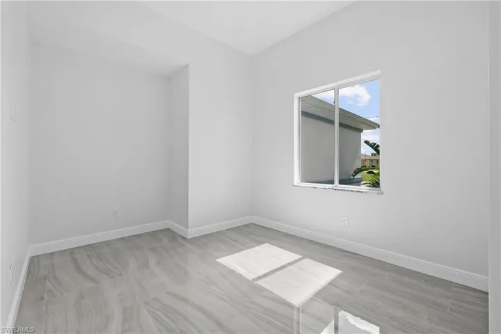 Spare room with baseboards