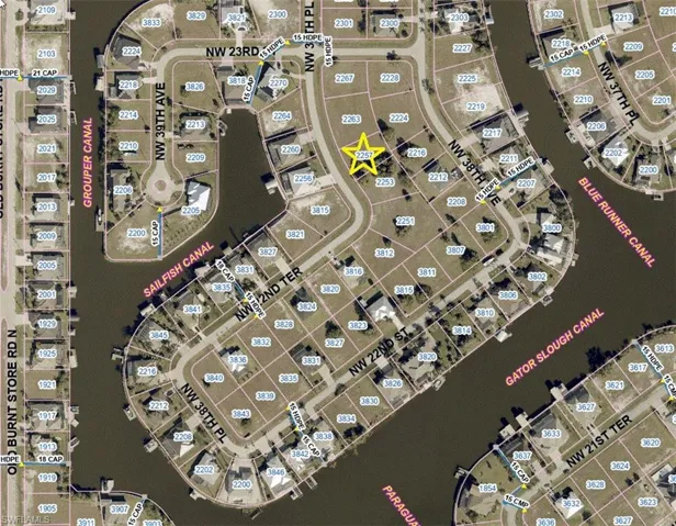 Aerial view of property's location & surrounding homes